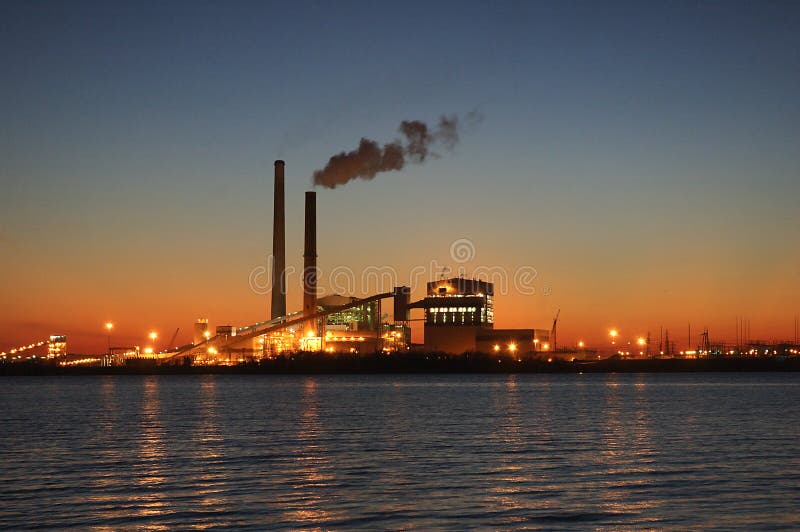 The bright lights are a blaze in the darken of the night sky. Industrial lights stock images, royalty-free photos and pictures