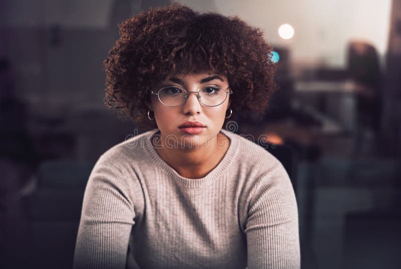 Night, office and focus of black woman programmer, software developer and cybersecurity internship. Reading, analysis royalty free stock photo