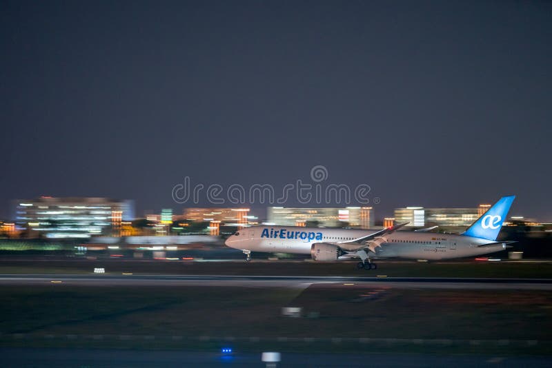 Night photo Air Europa landing at MIA tracking shot with motion blur stock photos Night photo Air Europa landing at MIA tracking shot with motion blur stock photos