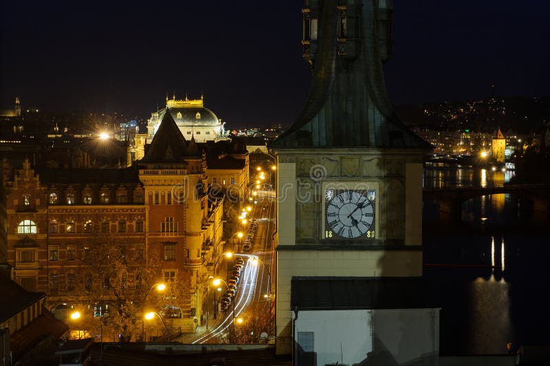 Night Prague with clock tower. Historical old town landscape view at dark.