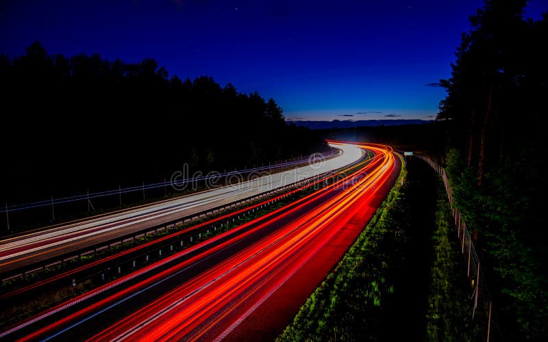 Night Road Lights. Lights of Moving Cars at Night Stock Photo Image