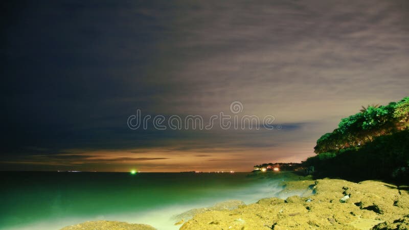 Night sea, beach and clouds