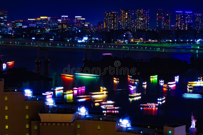 A night ships at Rainbow bridge at the urban city in Tokyo middle shot royalty free stock image A night ships at Rainbow bridge at the urban city in Tokyo middle shot royalty free stock image