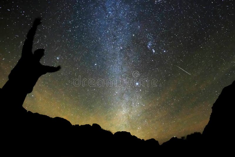 Night sky with stars ant meteor.