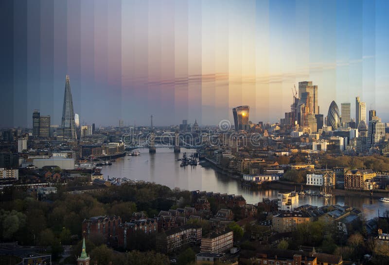 Night to day sliced time lapse view of the urban skyline of London, England, with Tower bridge, river Thames and City