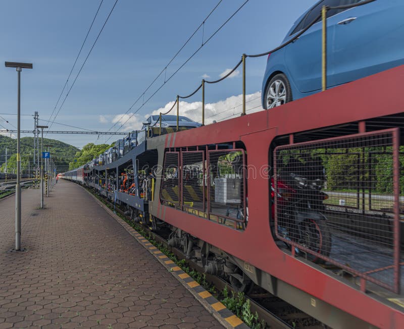 Night train with sleeping coaches and car motorcycle coaches Kysak station