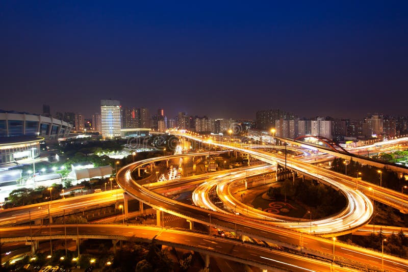 Night view of the bridge and city in shanghai