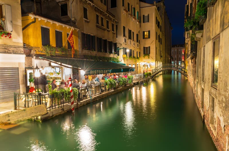 Night view of canal and restaurant in Venice stock photos Night view of canal and restaurant in Venice stock photos