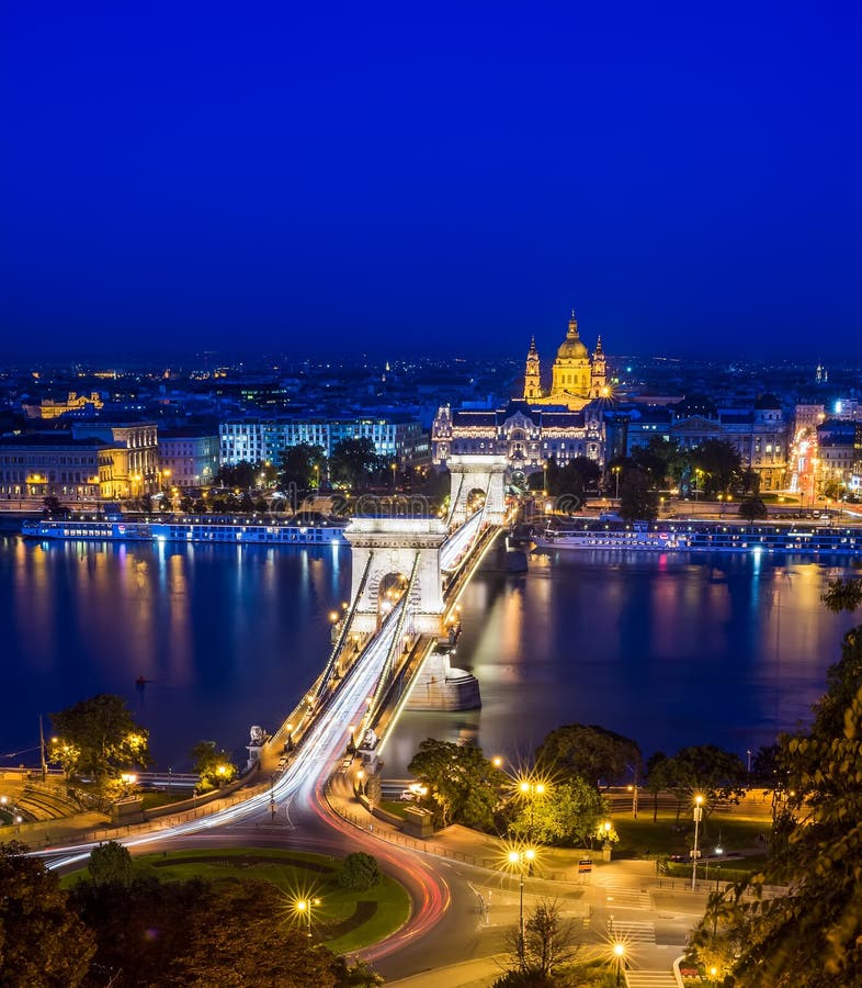 The night view of the Chain bridge, the Danube and Saint Istvan's basil from Buda castle area in Budapest, Hungary
