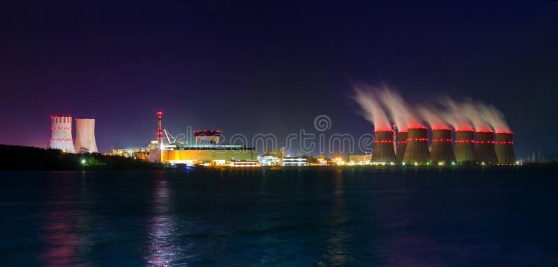 Night view of cooling towers of the Novovoronezh nuclear power plant from the co. Industry, environmental.