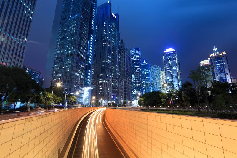 Night view of modern building and tunnel stock photos Night view of modern building and tunnel stock photos