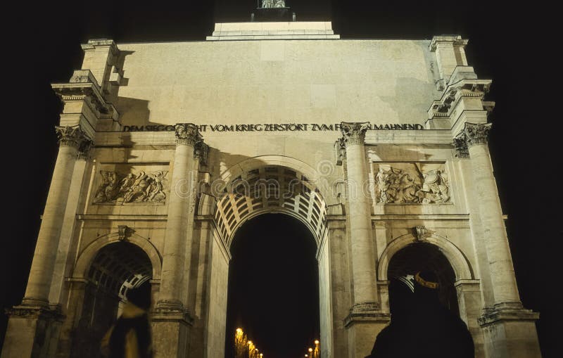 Night view of Siegestor triumphal arch in Schwabing Munich Germany illuminated historic monument and classical architecture royalty free stock photos
