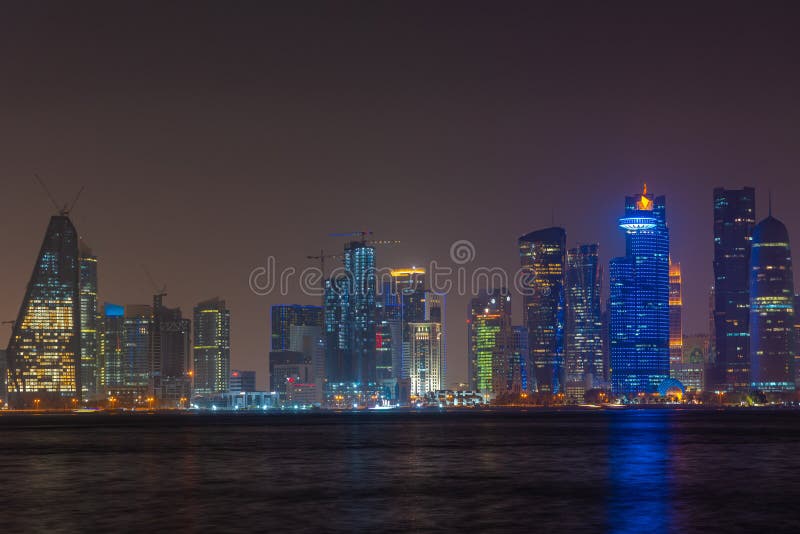 Night View of Skyline of Doha the Capital of Qatar Stock Photo
