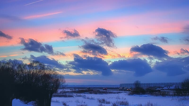 Night Winter Landscape With Pink Clouds At Sunset royalty free stock images Night Winter Landscape With Pink Clouds At Sunset royalty free stock images