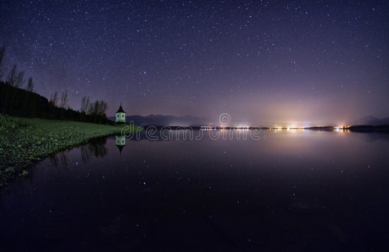 Nightsky with stars and lake