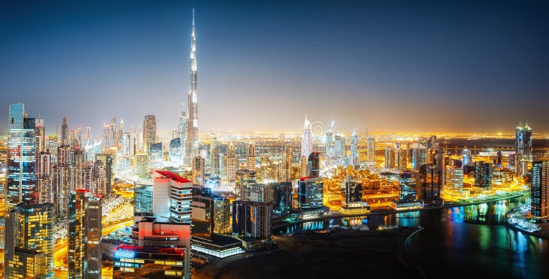 Nightttime skyline of a big futuristic city by night. Business bay, Dubai, United Arab Emirates. stock photography Nightttime skyline of a big futuristic city by night. Business bay, Dubai, United Arab Emirates. stock photography