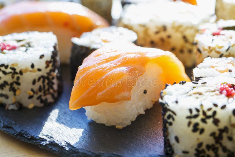 Nigiri Sushi Over Black Plate Stock Photo Image of plate, white 78273352