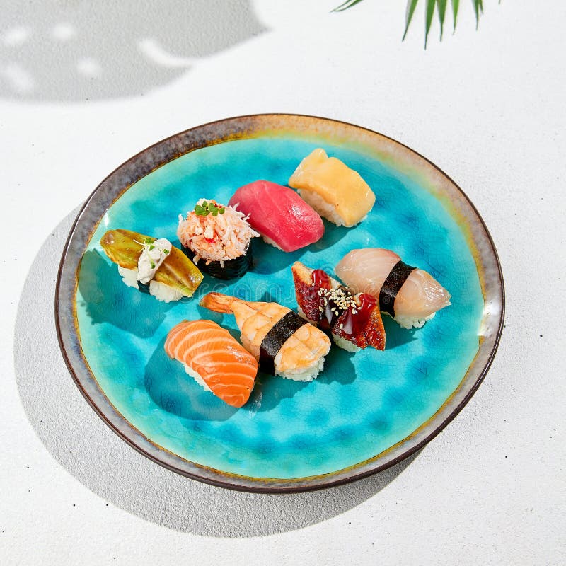 https://thumbs.dreamstime.com/b/nigiri-sushi-set-ceramic-plate-minimal-style-assorted-fish-crab-eel-tuna-shrimp-salmon-avocado-simple-white-244054869.jpg