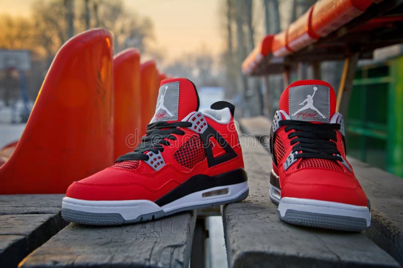 Nike Air Jordan 4 Retro Basketball Shoes Shot Outdoors. Krasnoyarsk, Russia - February 7, 2015 Editorial Photo - of casual, black: 173785226