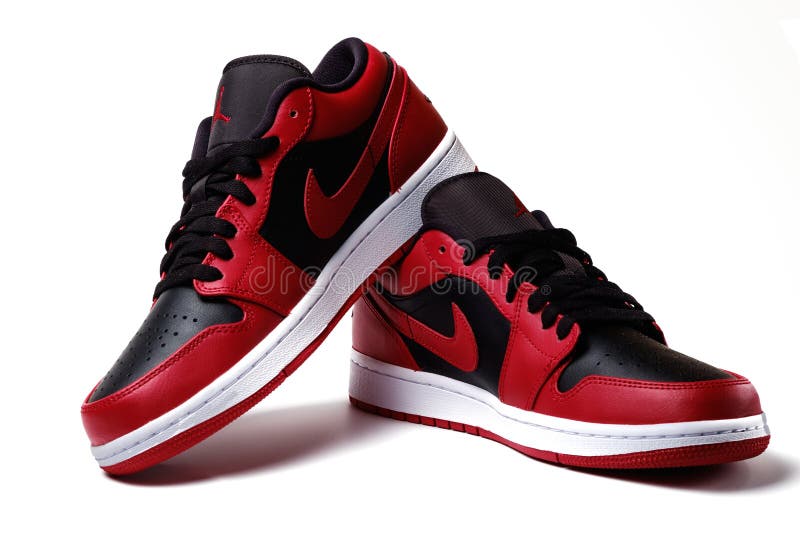 Nike Air Jordan 1 Retro Low Reverse Bred colorway sneakers isolated on white illustrative editorial