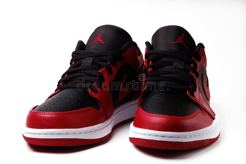 Nike Air Jordan 1 Retro Low Reverse Bred colorway sneakers isolated on white