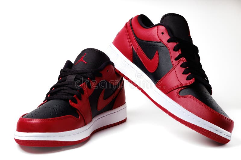 Nike Air Jordan 1 Retro Low Reverse Bred colorway sneakers isolated on white