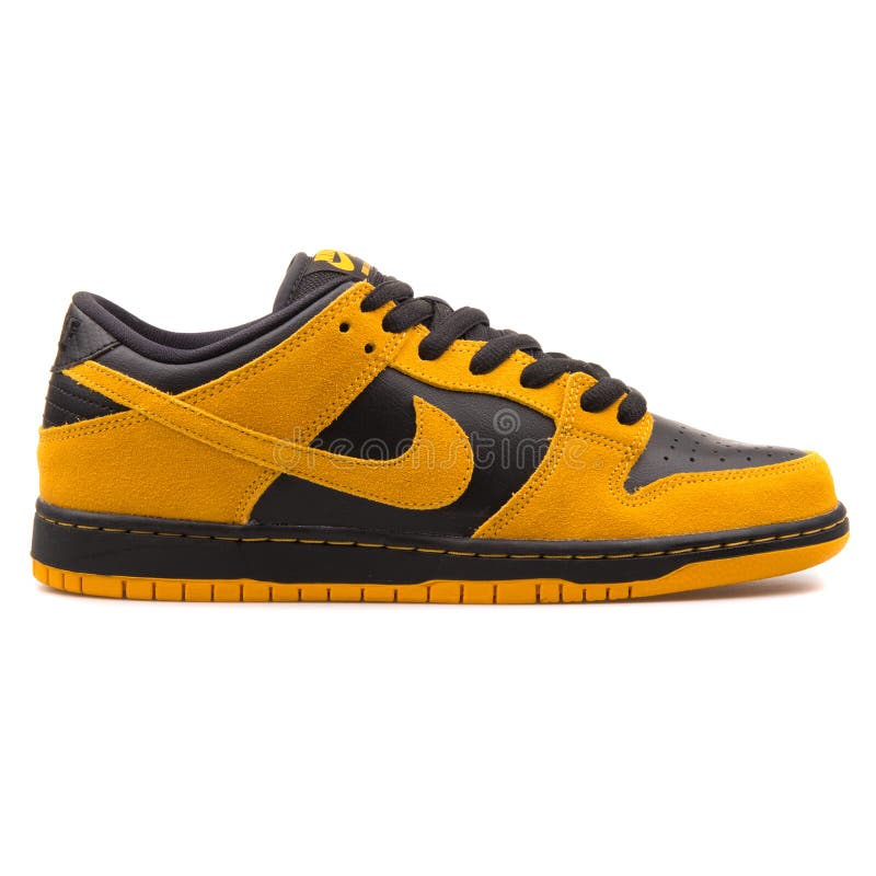nike dunks gold and black