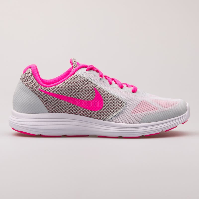 pink and grey nike revolution 3