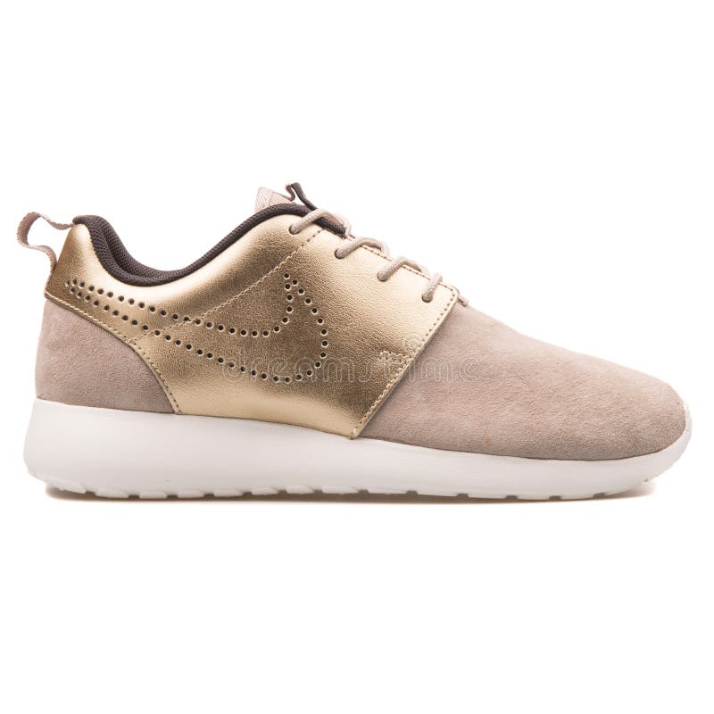 Nike Roshe One Premium Suede Beige and Gold Sneaker Editorial Image - Image of object, leather: 149297624