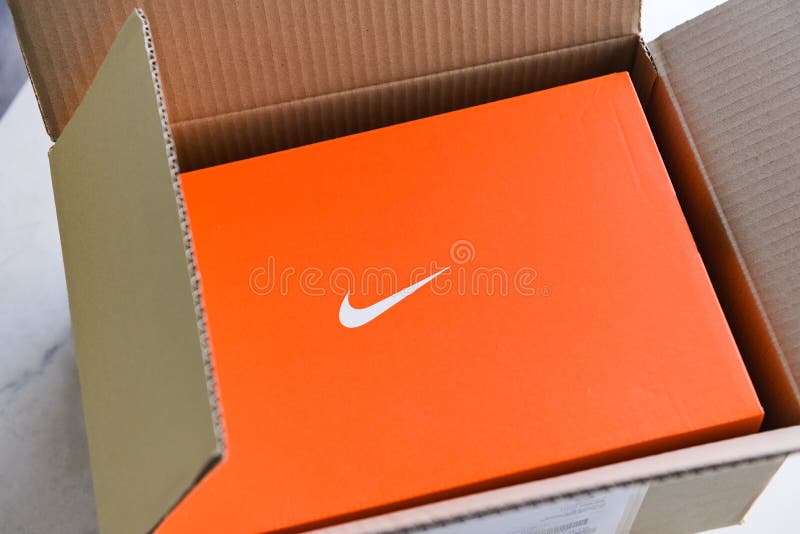 Nike Running Shoes Box with Nike Logo on Orange Box in the Store ...
