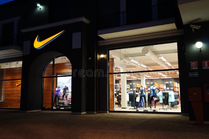 Silently Foreigner Paving Nike store editorial photography. Image of european, caserta - 49071422