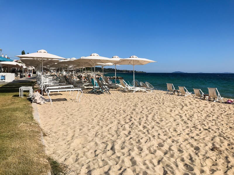 Nikiti Beach is in the Village of Nikiti with Sun Beds and Umbrellas ...