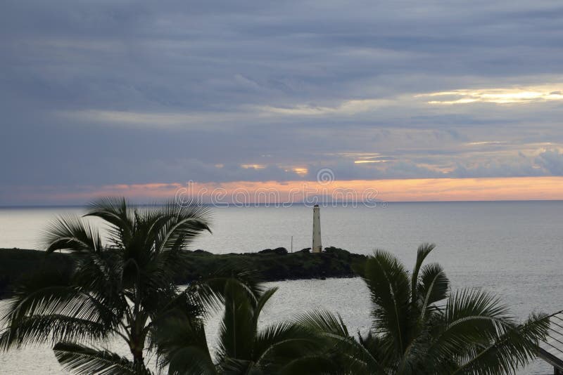 Ninini Lighthouse at sunrise and Oahu with Diamond stock image Ninini Lighthouse at sunrise and Oahu with Diamond stock image