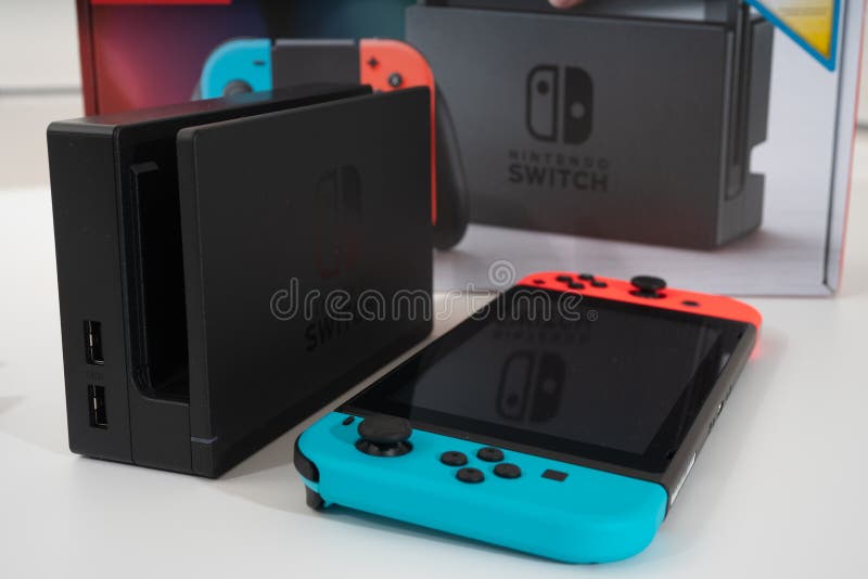 Nintendo Switch video game console developed by Nintendo, released on March  3, 2017 on a white background. Germany, Berlin - June 30, 2019: Nintendo  Switch Joy-con controller on a white background Stock Photo