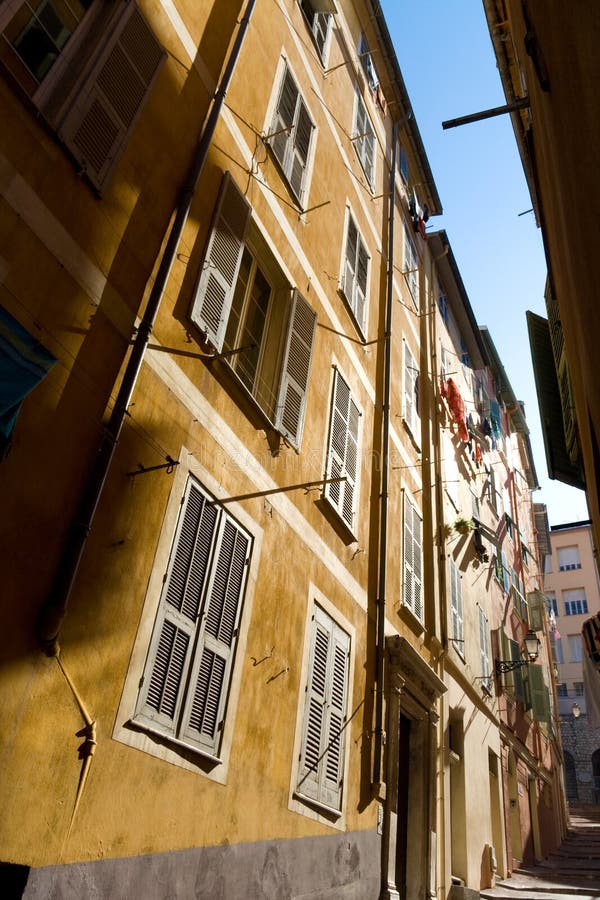 Typical Nice narrow street. Wide angle view. Typical Nice narrow street. Wide angle view.