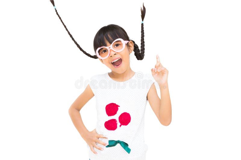 Niña asiática divertida del retrato con el pelo de la coleta foto de archivo