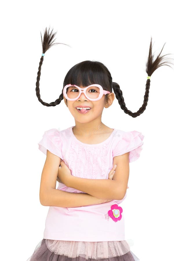 Niña asiática divertida del retrato con el pelo de la coleta fotografía de archivo