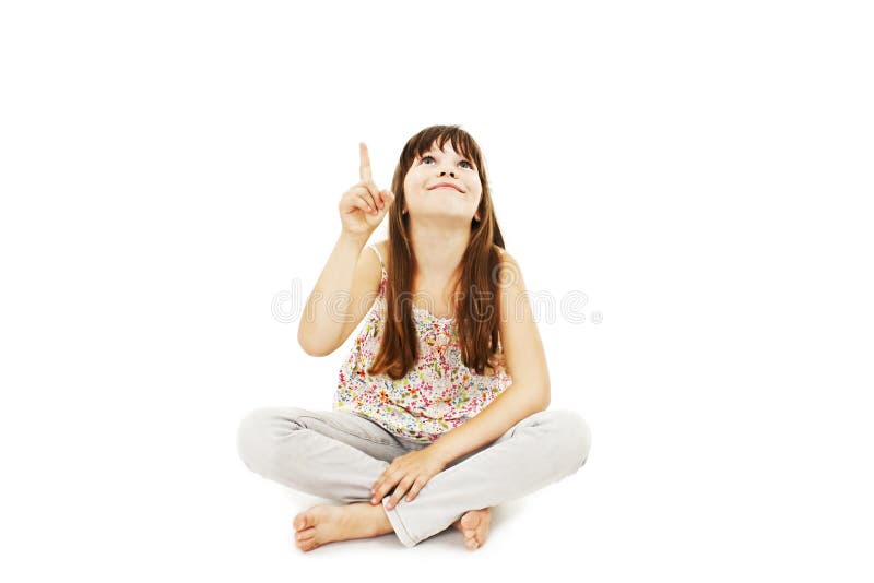 Beautiful little girl pointing with finger. Isolated on white background. Beautiful little girl pointing with finger. Isolated on white background