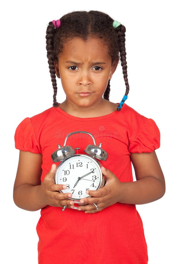 Niña triste con un reloj plateado fotografía de archivo libre de regalías Niña triste con un reloj plateado fotografía de archivo libre de regalías