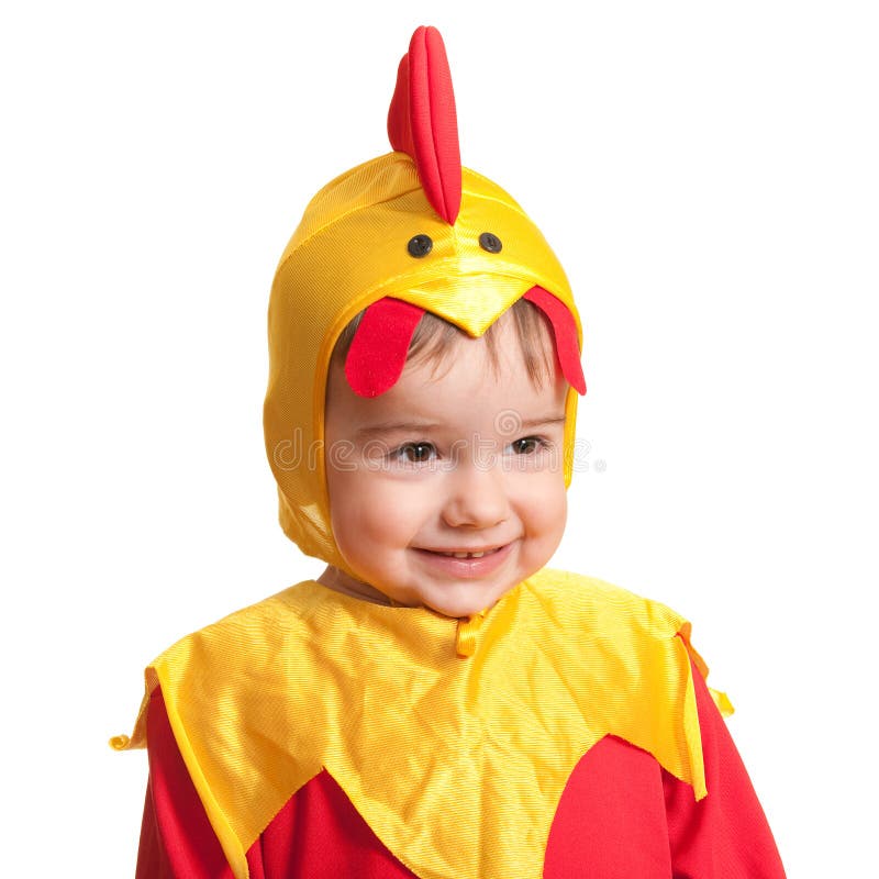 Niño alegre en un juego del carnaval de un polluelo imagen de archivo Niño alegre en un juego del carnaval de un polluelo imagen de archivo