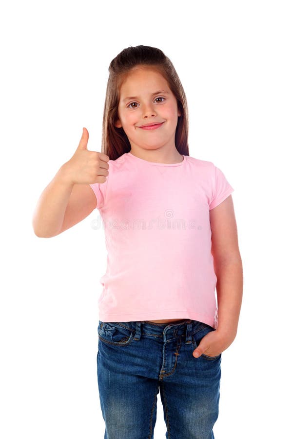 Niño amistoso que dice muy bien con su pulgar imagen de archivo libre de regalías Niño amistoso que dice muy bien con su pulgar imagen de archivo libre de regalías