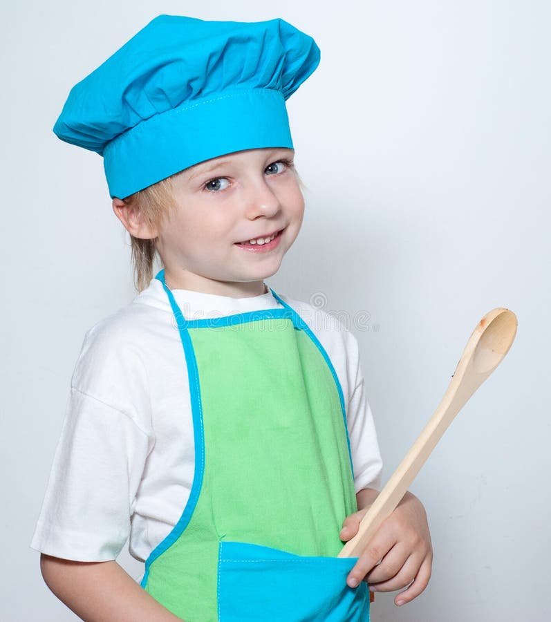 Niño como cocinero del cocinero fotos de archivo Niño como cocinero del cocinero fotos de archivo