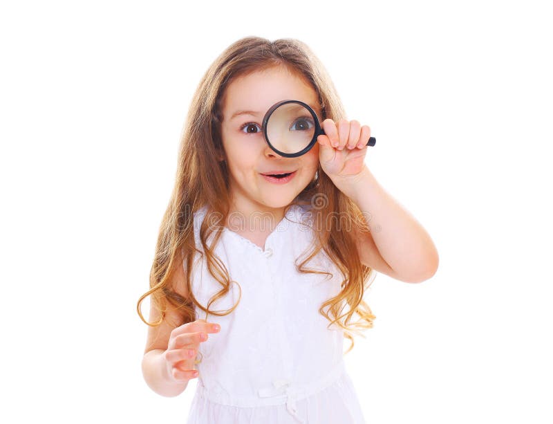 Funny little girl child looking through a magnifying glass on white background. Funny little girl child looking through a magnifying glass on white background