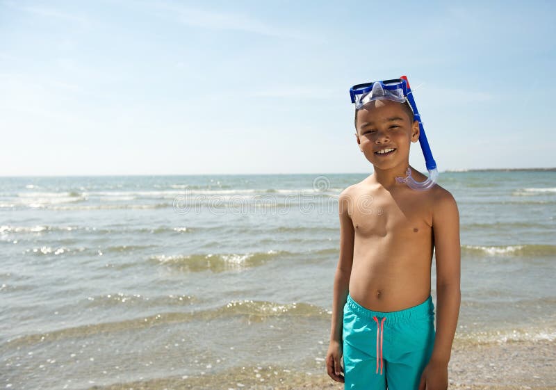 Close up portrait of a cute little kid smiling with snorkel. Close up portrait of a cute little kid smiling with snorkel