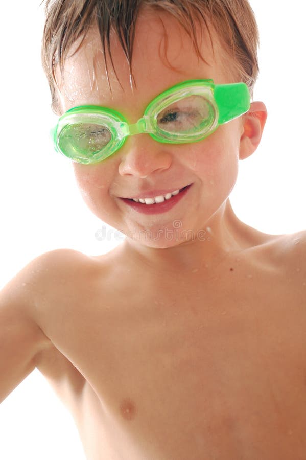 Happy child with swimming goggles over white background. Happy child with swimming goggles over white background