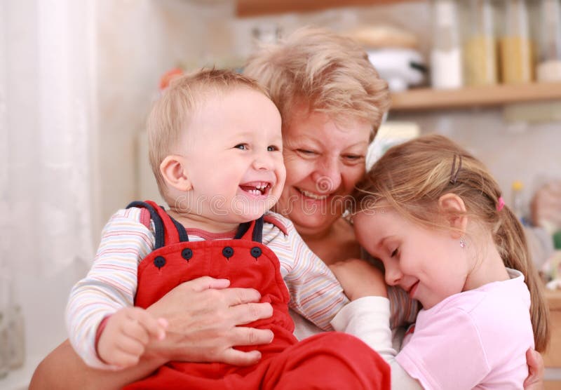 Cute little boy and little girl happy with grandmother. Cute little boy and little girl happy with grandmother