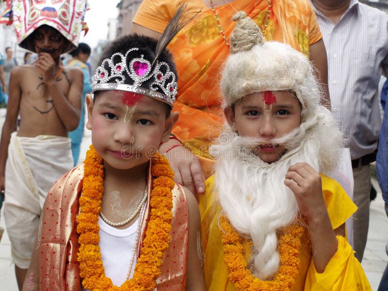 Children dressed as Hindu Gods participate in Gai Jatra Festival in Kathmandu, Nepal. Gai Jatra is a festival celebrated by the Newar community of Kathmandu valley every year since the Malla period. Every family who lost their member participate in this festival. They bring children or sometimes adult as well with resemblance of Radha Krishna or give them funny looks or resemblance of cow, yogi and other Hindu idol. Gai Jatra is a healthy festival which enables the people to accept the reality of death and to prepare oneself for the life after death. Children dressed as Hindu Gods participate in Gai Jatra Festival in Kathmandu, Nepal. Gai Jatra is a festival celebrated by the Newar community of Kathmandu valley every year since the Malla period. Every family who lost their member participate in this festival. They bring children or sometimes adult as well with resemblance of Radha Krishna or give them funny looks or resemblance of cow, yogi and other Hindu idol. Gai Jatra is a healthy festival which enables the people to accept the reality of death and to prepare oneself for the life after death.