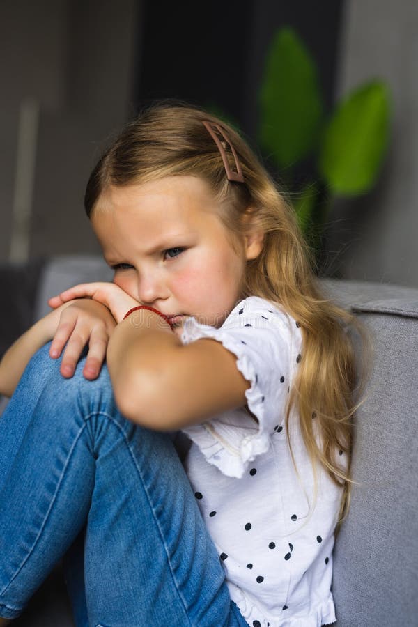 No One Wants To Play. Depressed Young Girl Hugging Her Knees and ...