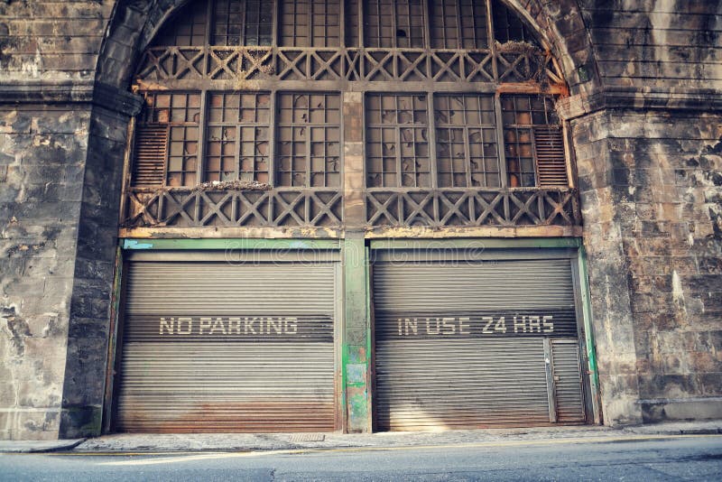 No parking place, in use 24 hours notice on old rusty vintage paint corrugated iron garage, Edinburgh, Scotland, United Kingdom. Autonomous self-driving royalty free stock images No parking place, in use 24 hours notice on old rusty vintage paint corrugated iron garage, Edinburgh, Scotland, United Kingdom. Autonomous self-driving royalty free stock images