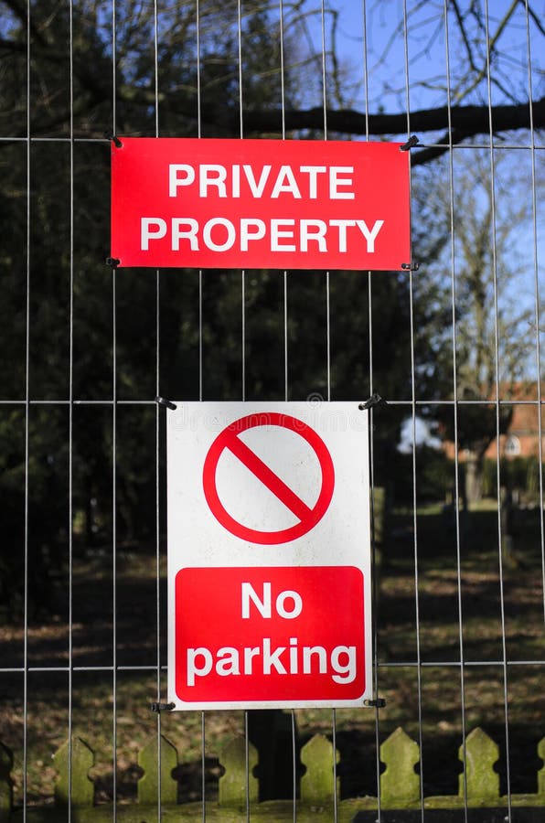 No parking sign on a fence stock image. Image of sign - 121868119